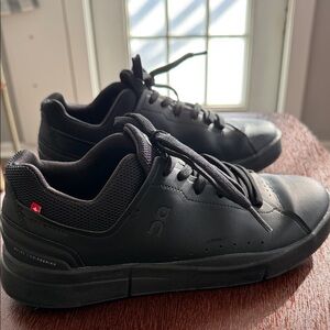 On Running Women's Black Low-Top Athletic Sneakers with Subtle Red Tab